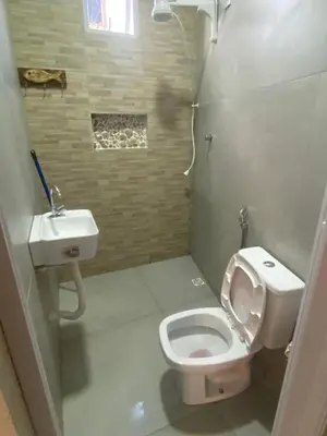 Uma casa de banho em Flecheiras Suite