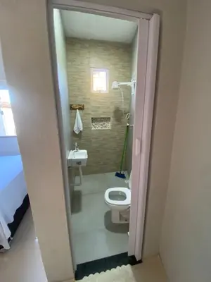 Uma casa de banho em Flecheiras Suite