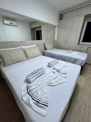 Uma cama ou camas num quarto em Apartamento Beach place Cumbuco 100metros Praia