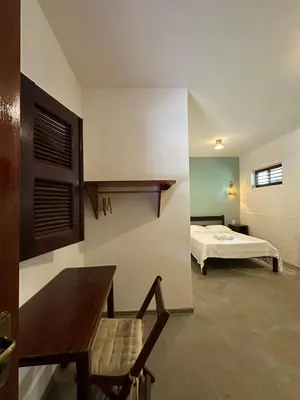 Uma cama ou camas num quarto em Vila Lua Aparts - Apartamento 3