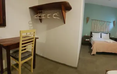 Uma cama ou camas num quarto em Vila Lua Aparts - Apartamento 3