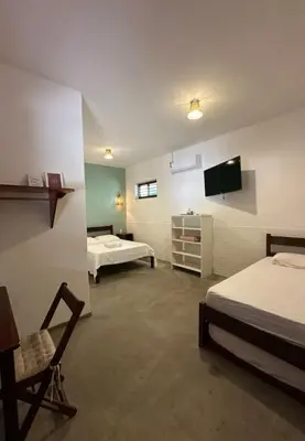 Uma cama ou camas num quarto em Vila Lua Aparts - Apartamento 4