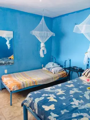 Uma cama ou camas num quarto em Casa da Barbie da Serra