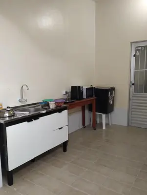 A cozinha ou kitchenette de Casa próximo centro de eventos com ar condicionado