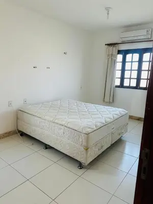 Uma cama ou camas num quarto em Pousada sua casa