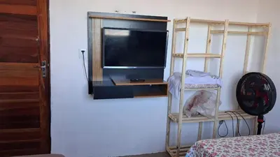 Uma cama ou camas num quarto em Chalé marlin azul