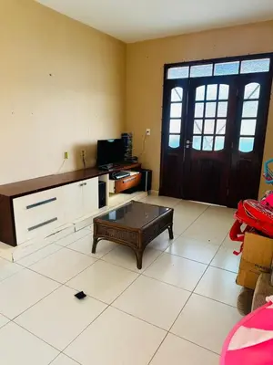 Uma televisão e/ou sistema de entretenimento em Pousada sua casa
