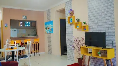 Uma televisão e/ou sistema de entretenimento em Apartamento para temporada na Praia do Futuro II - Fortaleza CE