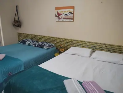 Uma cama ou camas num quarto em Apartamento para temporada na Praia do Futuro II - Fortaleza CE