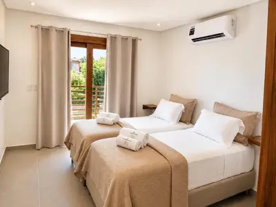 Uma cama ou camas num quarto em Apartamento Messina - Grupo Messina