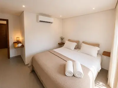 Uma cama ou camas num quarto em Apartamento Messina - Grupo Messina