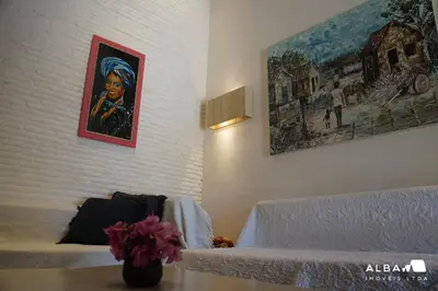 Uma cama ou camas num quarto em Casa Minerva Pontal