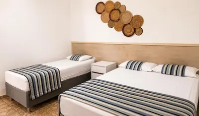 Uma cama ou camas num quarto em Casa Porto das Dunas