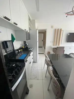 A cozinha ou kitchenette de CN Porto das Dunas Beach