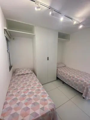 Uma cama ou camas num quarto em CN Porto das Dunas Beach