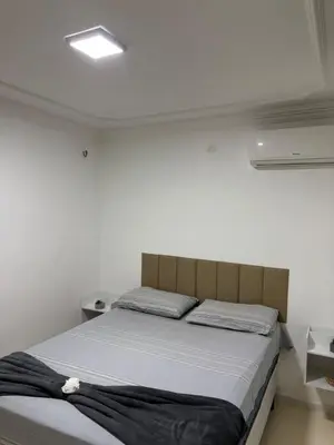 Uma cama ou camas num quarto em Central apartamento Flor de Cheiro