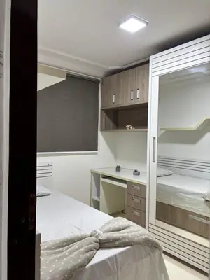 Uma cama ou camas num quarto em Central apartamento Flor de Cheiro