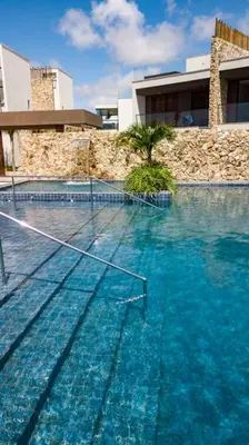 A piscina em ou perto de Loft Charmoso com Rooftop no Vila das Dunas
