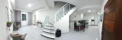 Uma televisão e/ou sistema de entretenimento em Casa de veraneio