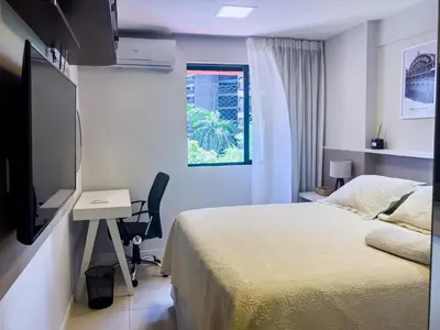A planta de Flat moderno, 2 quartos dentro de hotel famoso