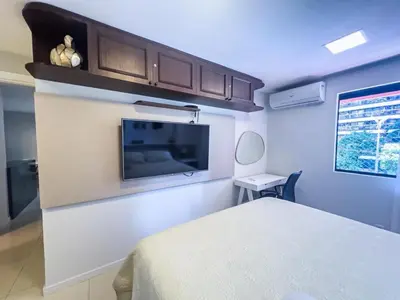 A planta de Flat moderno, 2 quartos dentro de hotel famoso