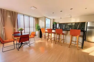 A cozinha ou kitchenette de Apartamento confortável e próximo da praia