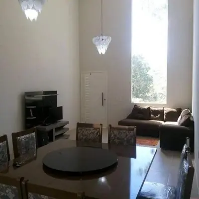 Uma área de estar em Sítio Solar Santa Cecília(Alto Padrão)