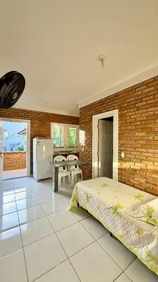 Uma cama ou camas num quarto em Chalés Santo Antônio em Flecheiras