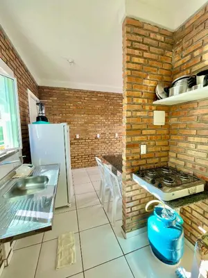 A cozinha ou kitchenette de Chalés Santo Antônio em Flecheiras