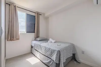 Uma cama ou camas num quarto em Mirante #807 - Praia do Futuro por Carpediem