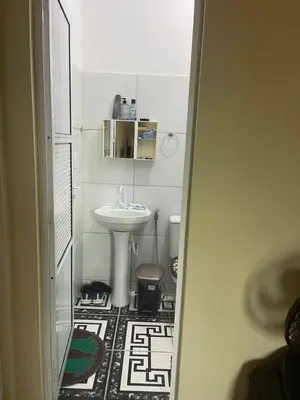 Uma casa de banho em Casa da mae