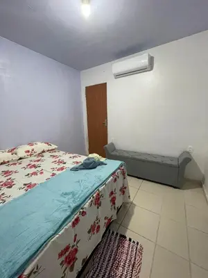 Uma cama ou camas num quarto em Pousada Quinta das Flores