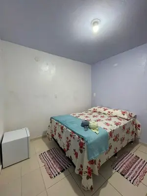 Uma cama ou camas num quarto em Pousada Quinta das Flores