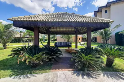 Um jardim no exterior de VG Sun Cumbuco Delicinha de Apto para 4 pessoas