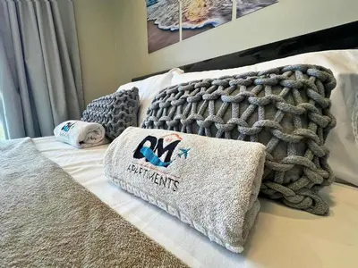 Uma cama ou camas num quarto em VG Sun Cumbuco Delicinha de Apto para 4 pessoas
