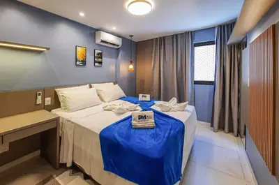 Uma cama ou camas num quarto em JSmart Novinho 4 Pessoas Super Completo WiFi Top
