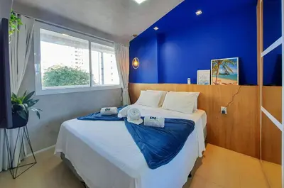 Uma cama ou camas num quarto em Luxuoso e Moderno Studio One Milenio no Cocó