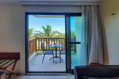 Uma varanda ou terraço em VG Sun Cumbuco Nascente Vista Mar 4 Pessoas