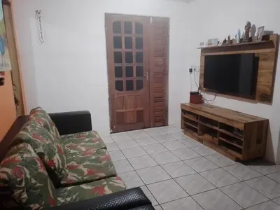 Uma televisão e/ou sistema de entretenimento em Chácara da Lilian