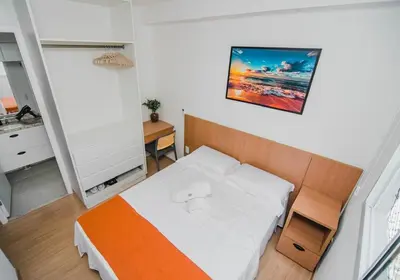 Uma cama ou camas num quarto em Apartamento Vista Mar - 708