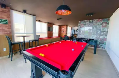 Uma mesa de bilhar em Apartamento Vista Mar - 708