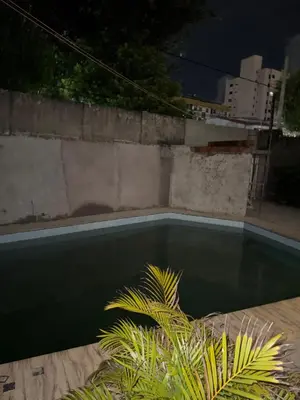 A piscina em ou perto de Suites em mansão