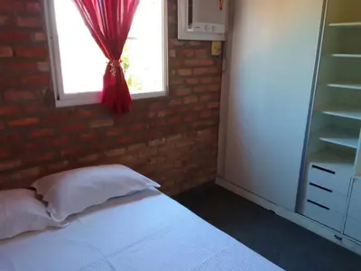 Uma cama ou camas num quarto em Wind Villa Cumbuco - Casa