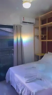 Uma cama ou camas num quarto em Triplex Flecheiras
