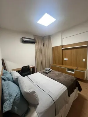Uma cama ou camas num quarto em Apartamento com vista Beira-Mar
