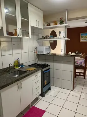 A cozinha ou kitchenette de Apartamento Costa do Sol