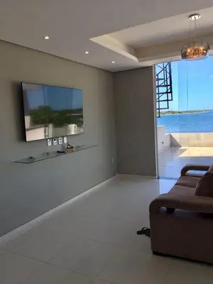 Uma televisão e/ou sistema de entretenimento em Apartamento Lagoa do Paraiso - Jericoacoara