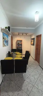 Uma televisão e/ou sistema de entretenimento em Brisa Mar