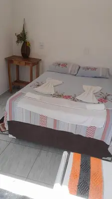 Uma cama ou camas num quarto em Econômico Suíte Standard Vila Jeri