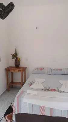 Uma cama ou camas num quarto em Econômico Suíte Standard Vila Jeri